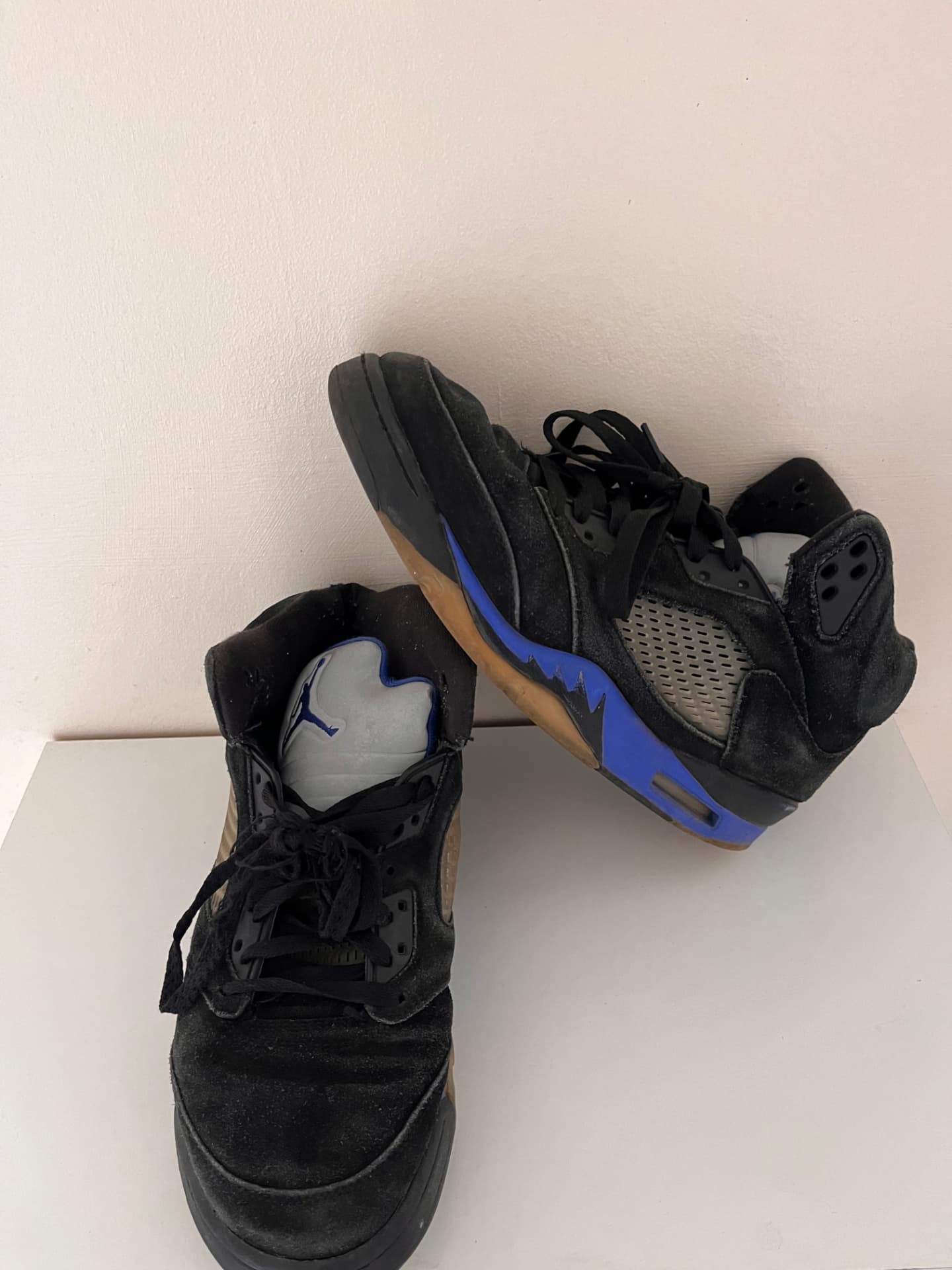 Dusty black suede Air Jordan 5 sneakers before cleaning
